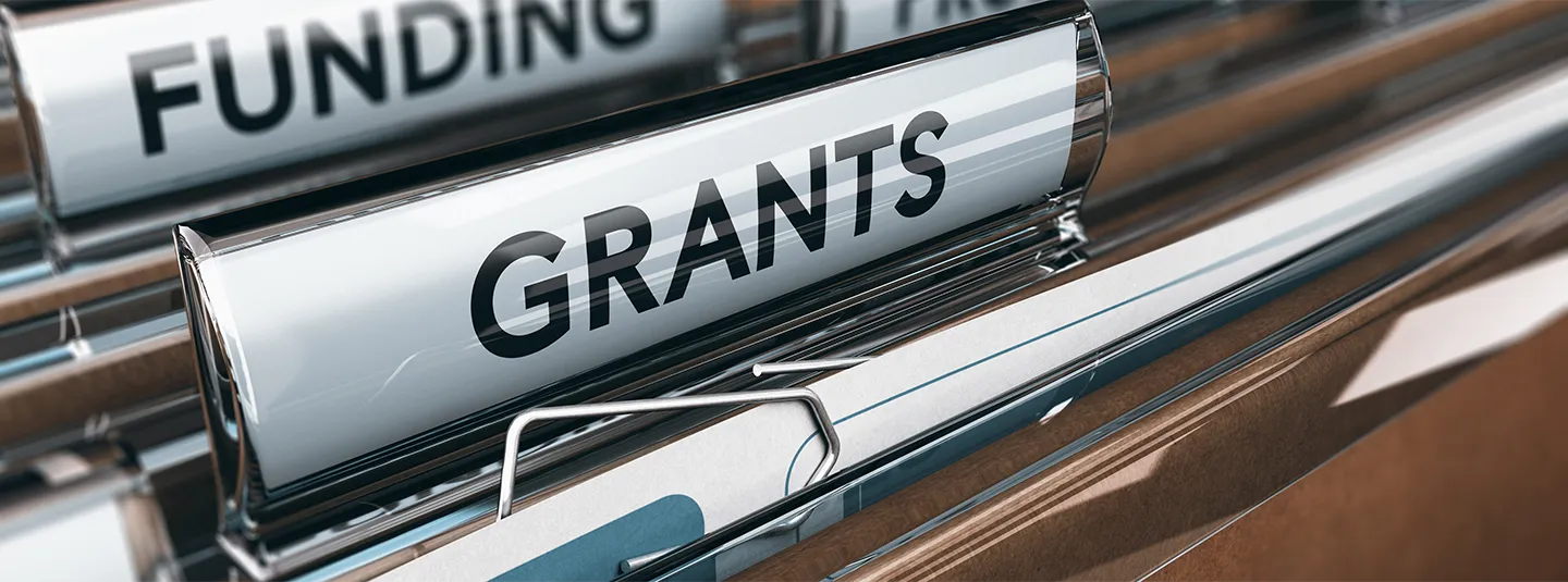 Grants and funding file folders.