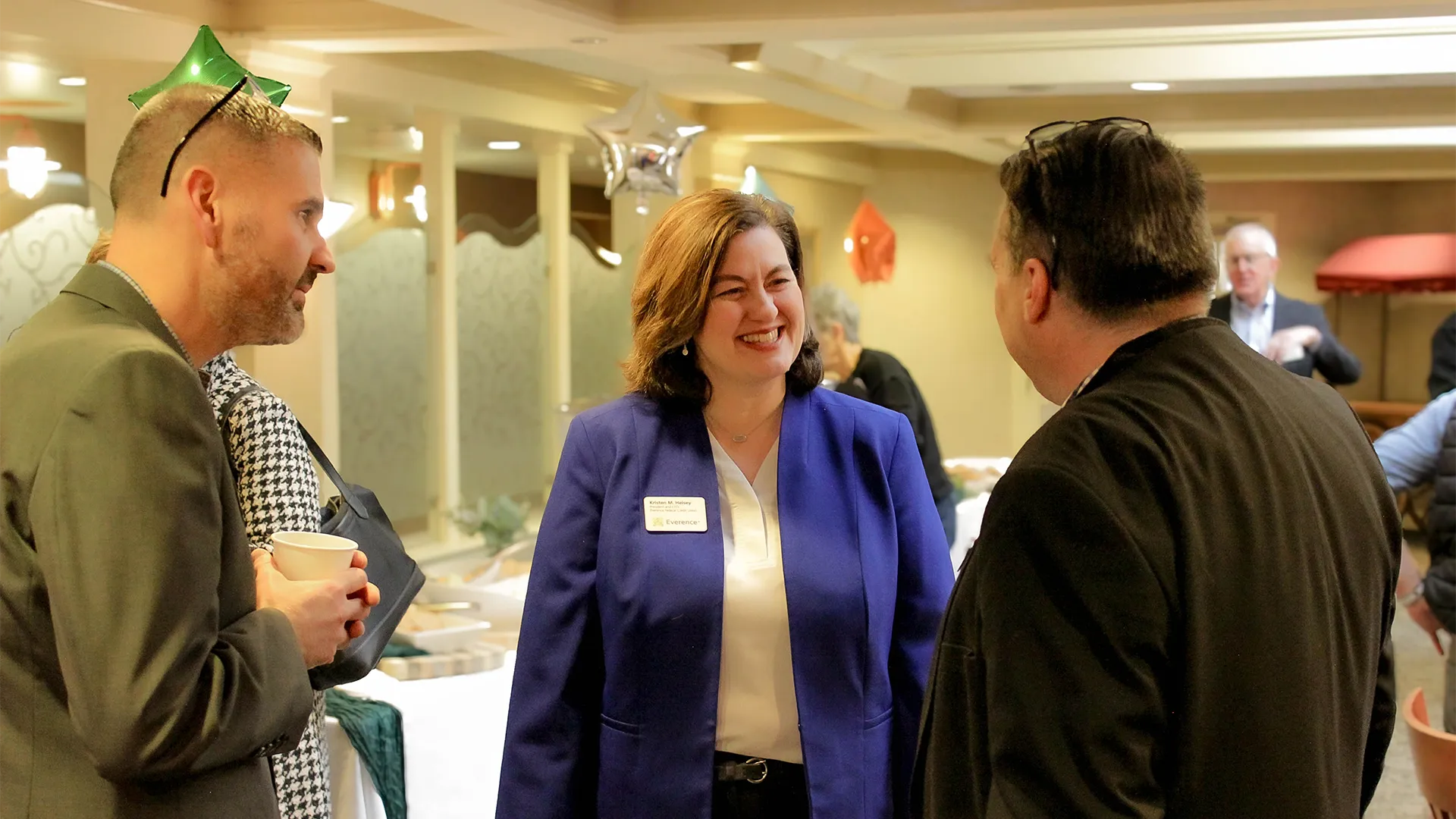 People in conversation at an Everence event.