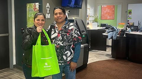 Raul and Veronica Castro celebrate after closing on a loan with Everence Federal Credit Union in Philadelphia.
