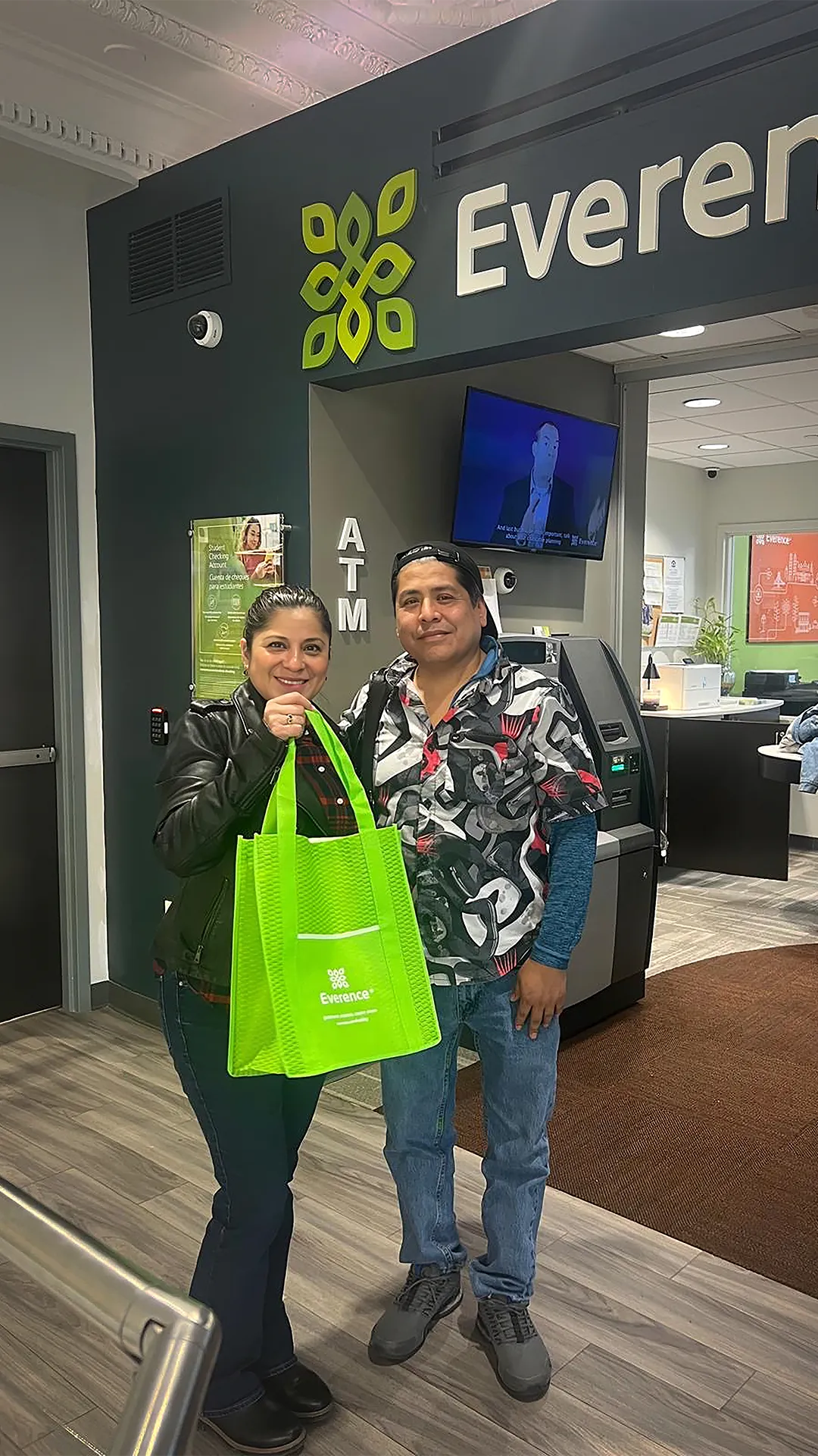 Raul and Veronica Castro celebrate after closing on a loan with Everence Federal Credit Union in Philadelphia.