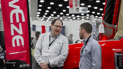 Tim Penner with employee at Harper Industries