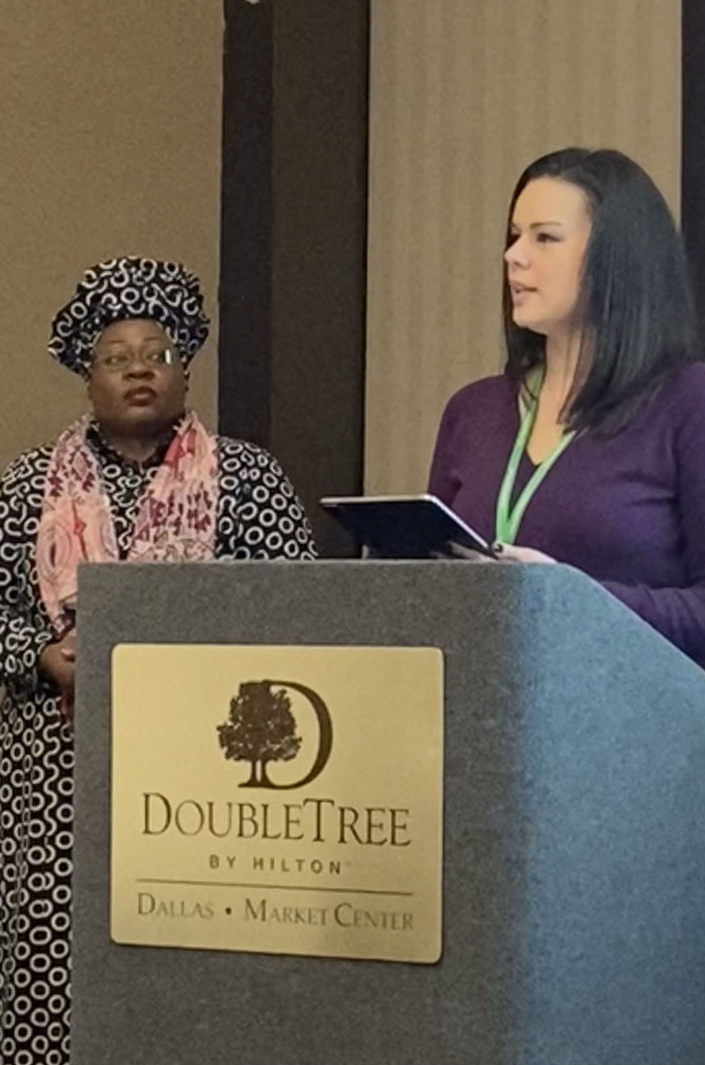 Madalyn Metzger (right), Everence Chief Marketing Officer, provides a report during the 2024 Hope for the Future gathering. She is joined by Sibonokuhle Ncube (left), Mennonite Mission Network Regional Director for Africa and Europe. (Photo courtesy of Sue Park-Hur, Mennonite Church USA.)