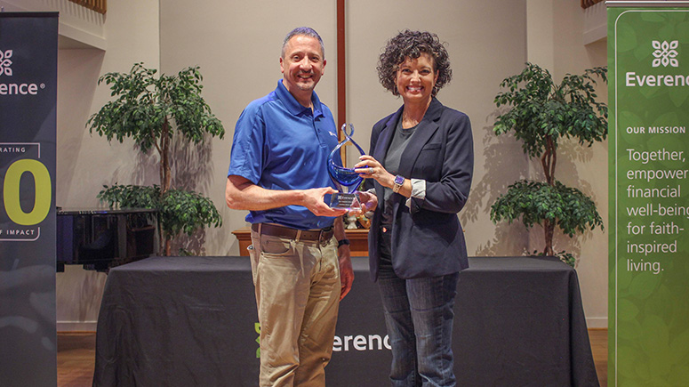 Amanda Rock, consultant of the year, poses with her award.