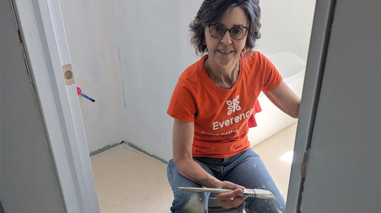 Elaine Fry, Everence employee, serving by painting