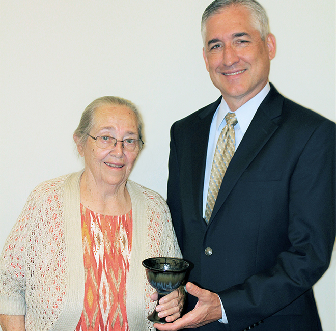 Johanna Sutter accepts Journey Award from Ken Hochstetler