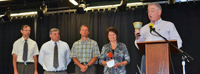 Larry Miller presents award