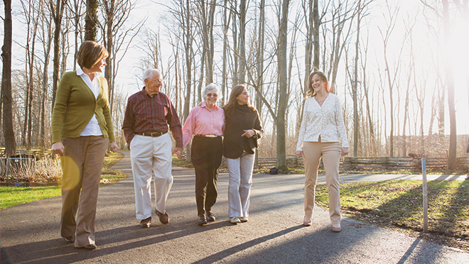 Mast family walking outside