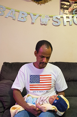 Mussie Atoshm and new son, Sergel.