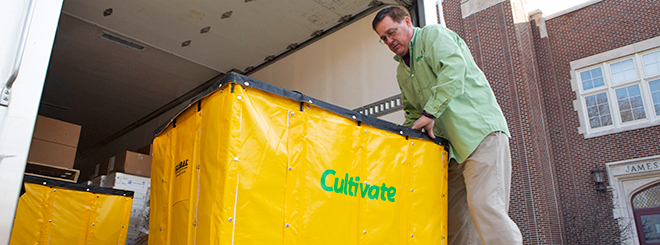 Cultivate bins being loaded into the truck.