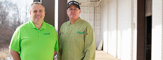 Jim and Randy pose for a photo