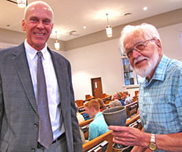 Bruce and Jay pose for a photo in the church