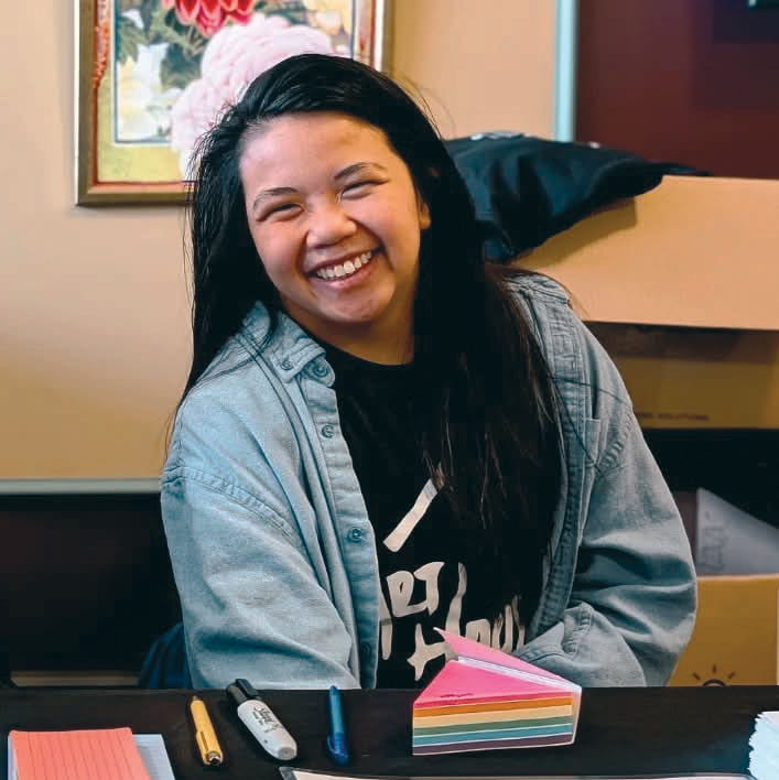 A portrait of a woman smiling