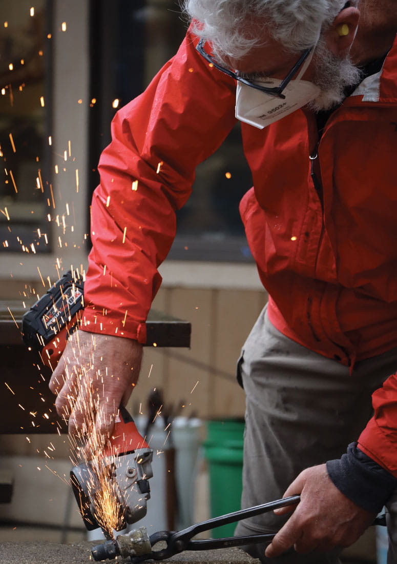 Man forging on fire.