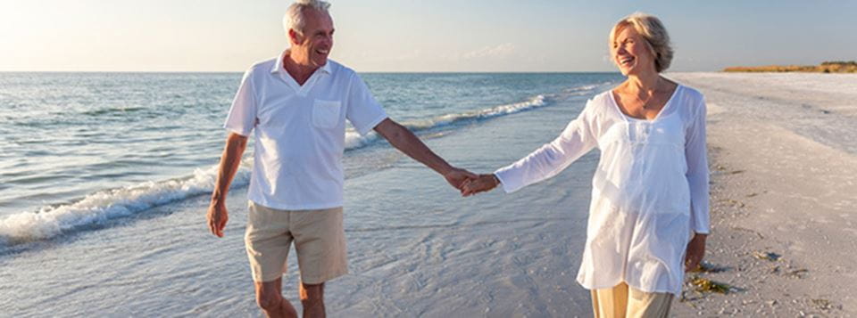 Couple walking the beach