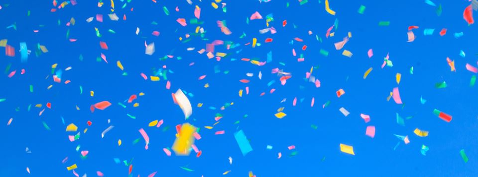 Confetti against a dark blue background