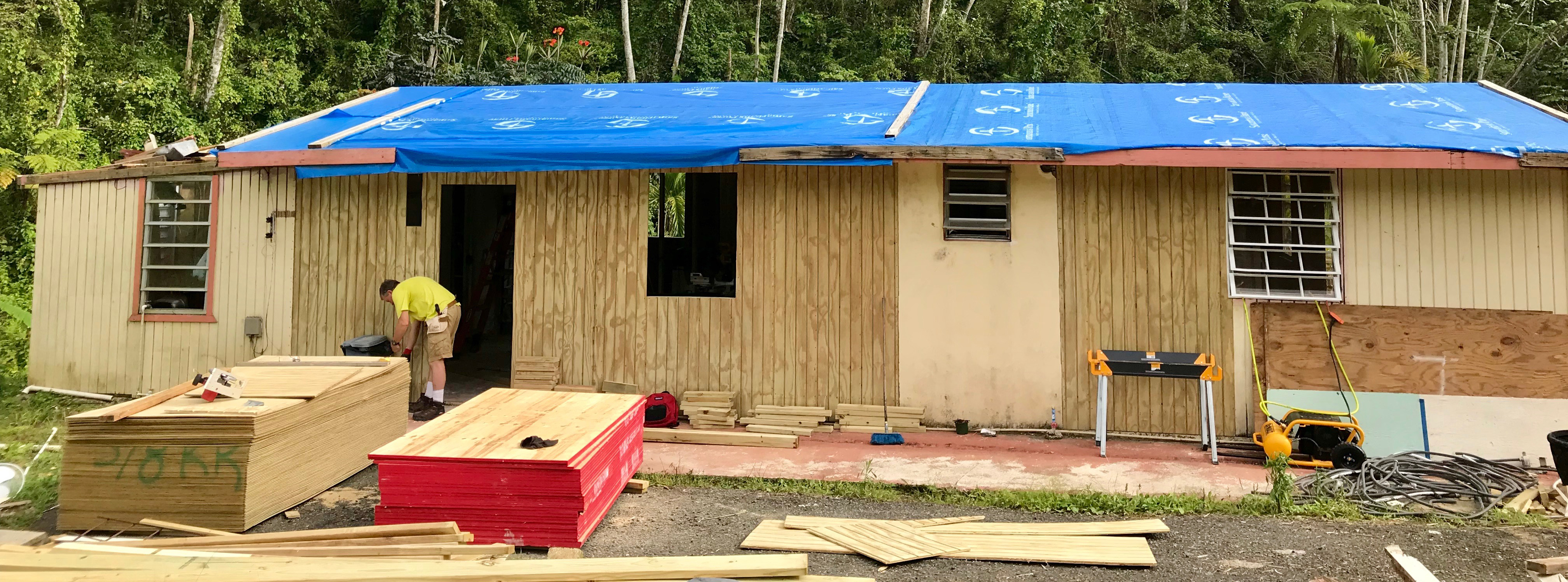 Everence service project, Aibonito, Puerto Rico home under construction with tarp on roof