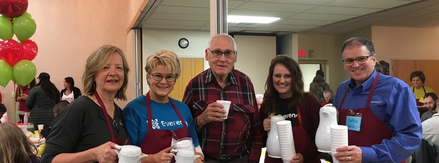 Everence employees serving coffee