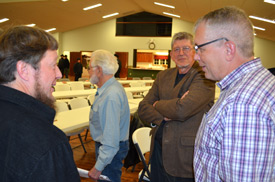 Everence faith and finance team talking with clients