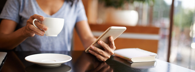 Woman checking her account on her phone