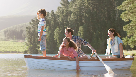 Family in a boat on a lake