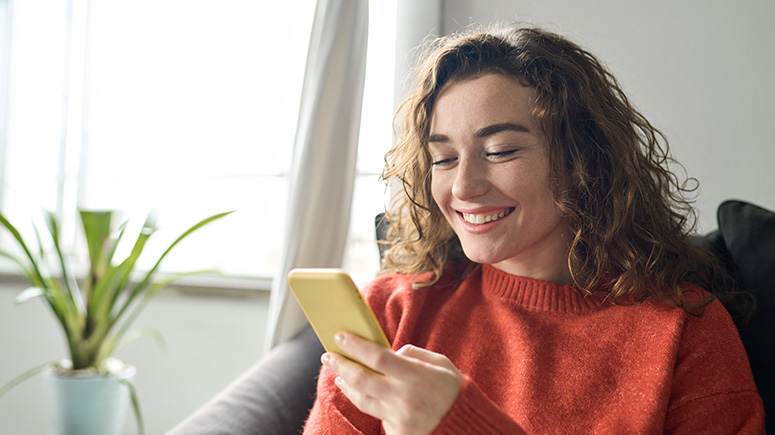 Young adult woman on her cell phone