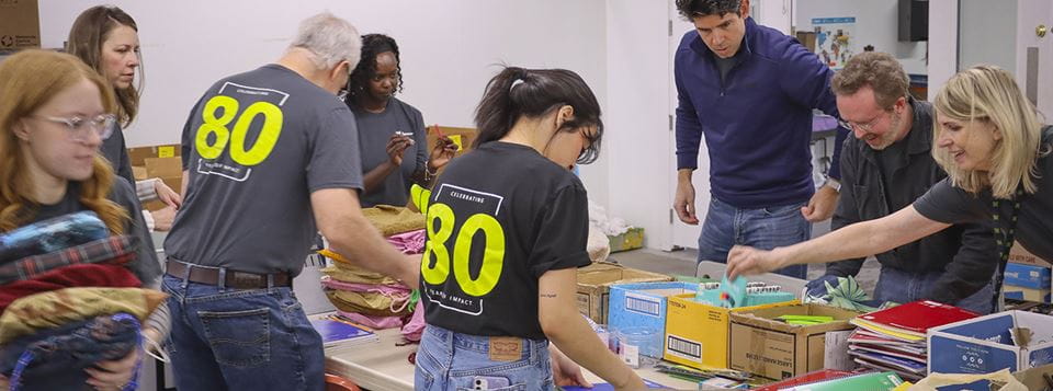 Employees packing relief kits