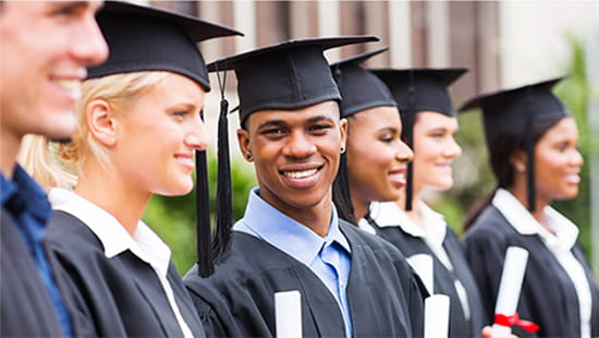 College graduates in cap and gown