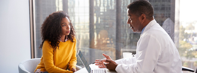Doctor talking to patient
