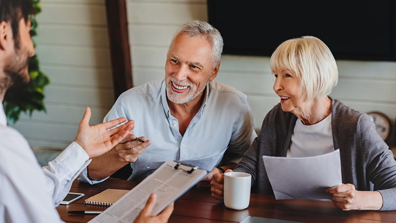 Older couple meeting with advisor
