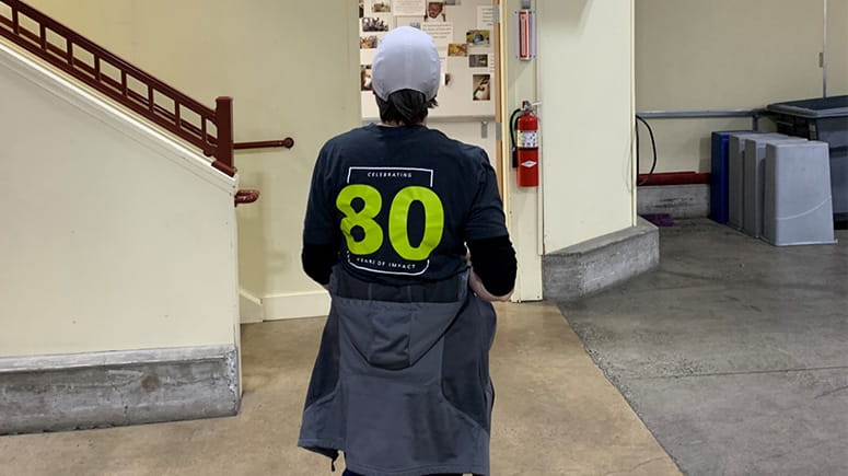 Everence employee volunteers to pack bacon for Blessings of Hope.