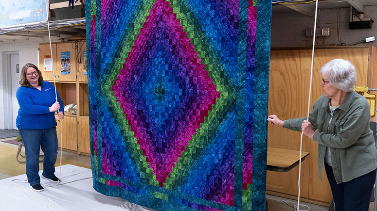 Diana Voth serves at Pennsylvania relief sale