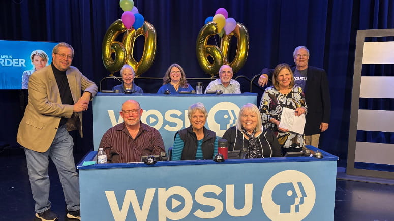Everence employee volunteers to answer phones at WPSU pledge night.